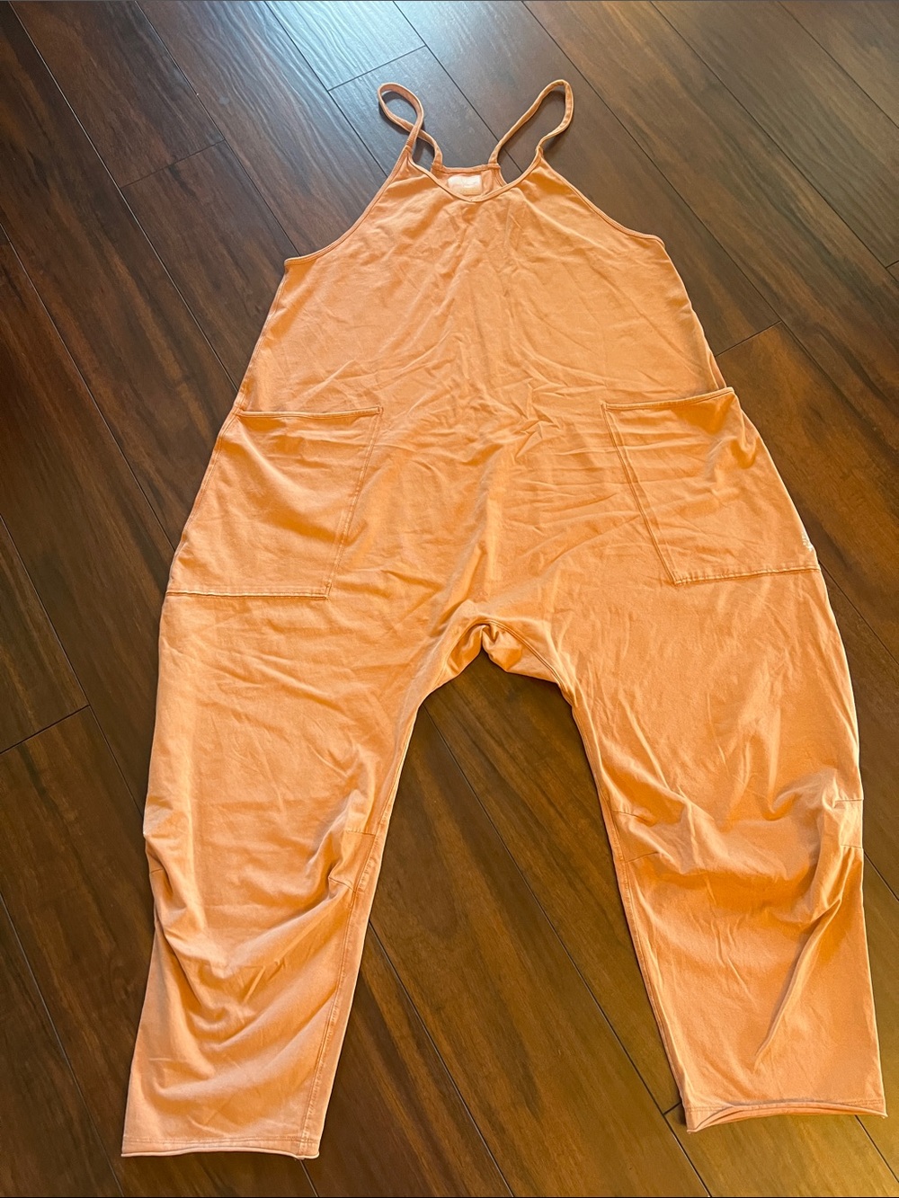Free People movement hot shot onesie in washed orange size M